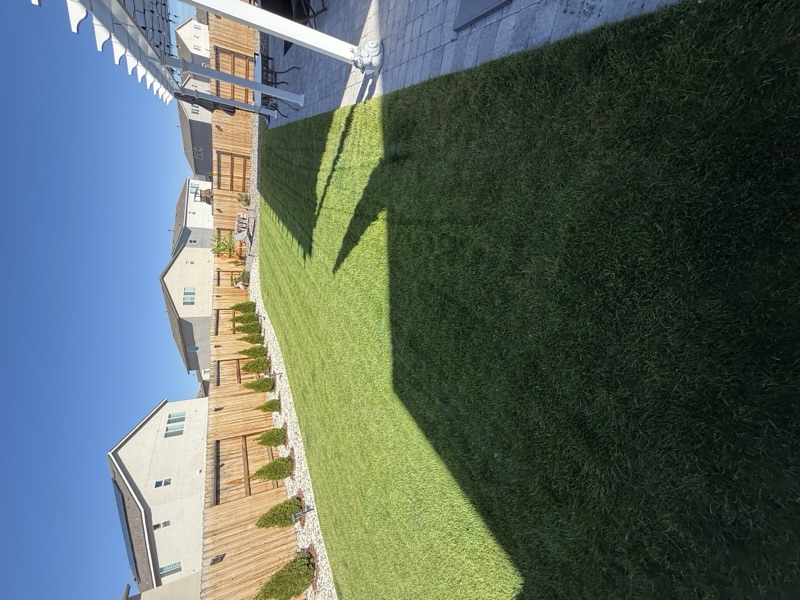 Spring fertilization treatment being applied to a Spanish Springs lawn